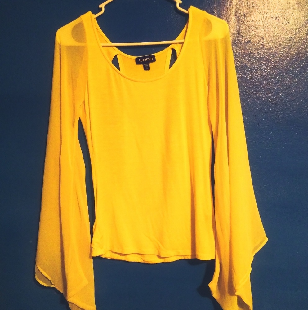 Bebe size xs yellow flowy shirt.